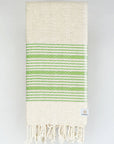 Folded green colour with multiple stripes on a plain beige colour.