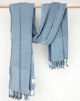 100% cotton scarf in plain grey colour with knotted fringe and hand-twisted style on the stick.