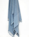 100% cotton scarf in plain grey colour with knotted fringe hanging.